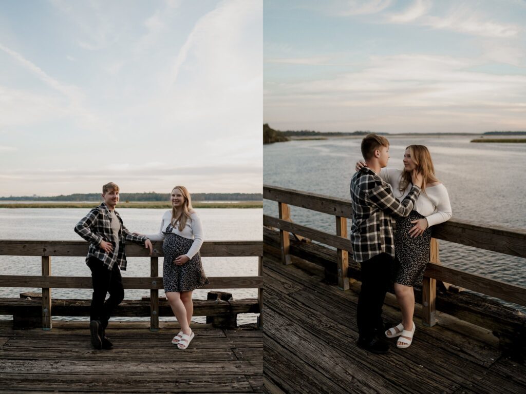 A couple stands on a wooden pier overlooking a scenic body of water. On the left side, they are standing apart, smiling directly at the camera. On the right side, they are embracing and looking into each other's eyes, creating a romantic atmosphere reminiscent of a maternity photoshoot in Charleston SC.