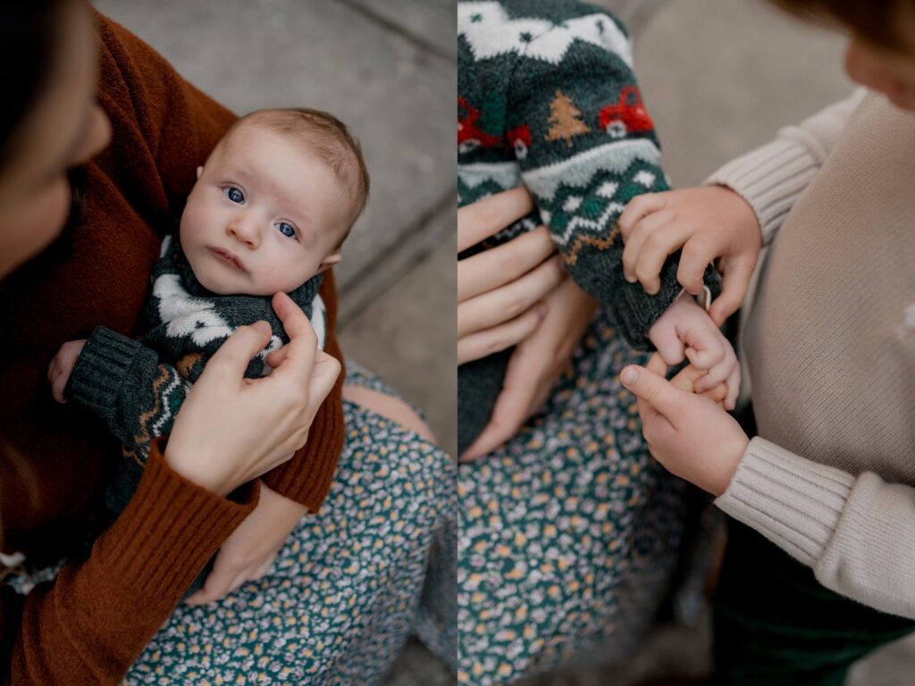 Two images show a woman cradling an infant. In the left image, the infant, dressed in a patterned sweater, looks up while being held. The right image focuses on a child holding the infant's hand and touching their arm, also showing parts of the woman's hands and skirt.